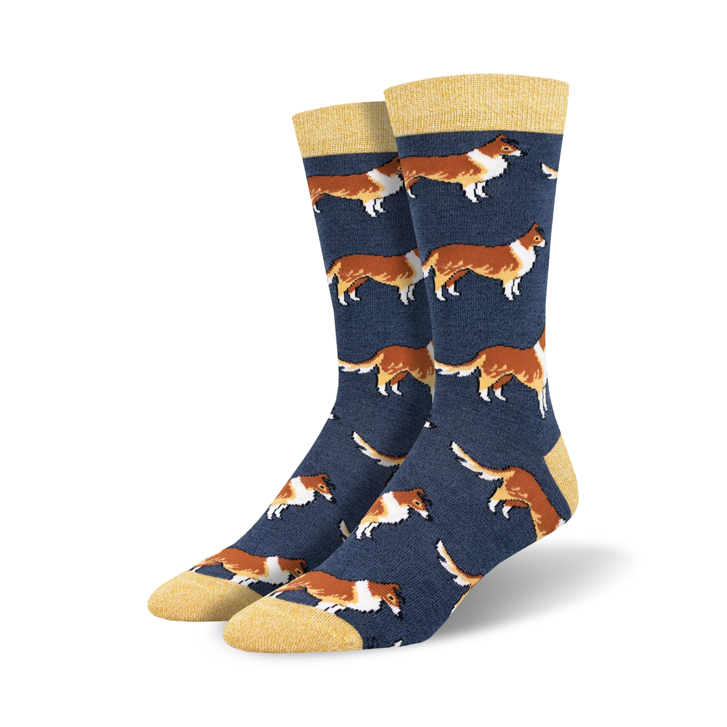 Pair of navy blue crew socks featuring a repeating pattern of brown and white Collie dogs. Socks have a yellow cuff.