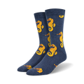 Pair of navy blue crew socks featuring a repeating pattern of yellow seahorses. Made from a bamboo blend.