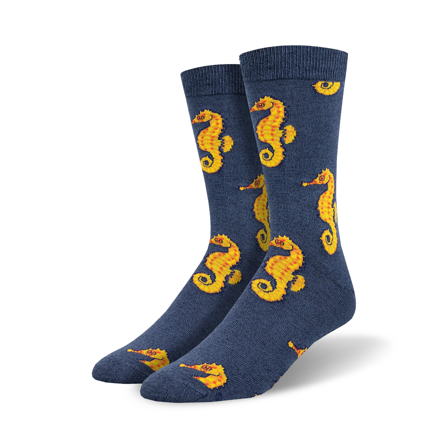 Pair of navy blue crew socks featuring a repeating pattern of yellow seahorses. Made from a bamboo blend.
