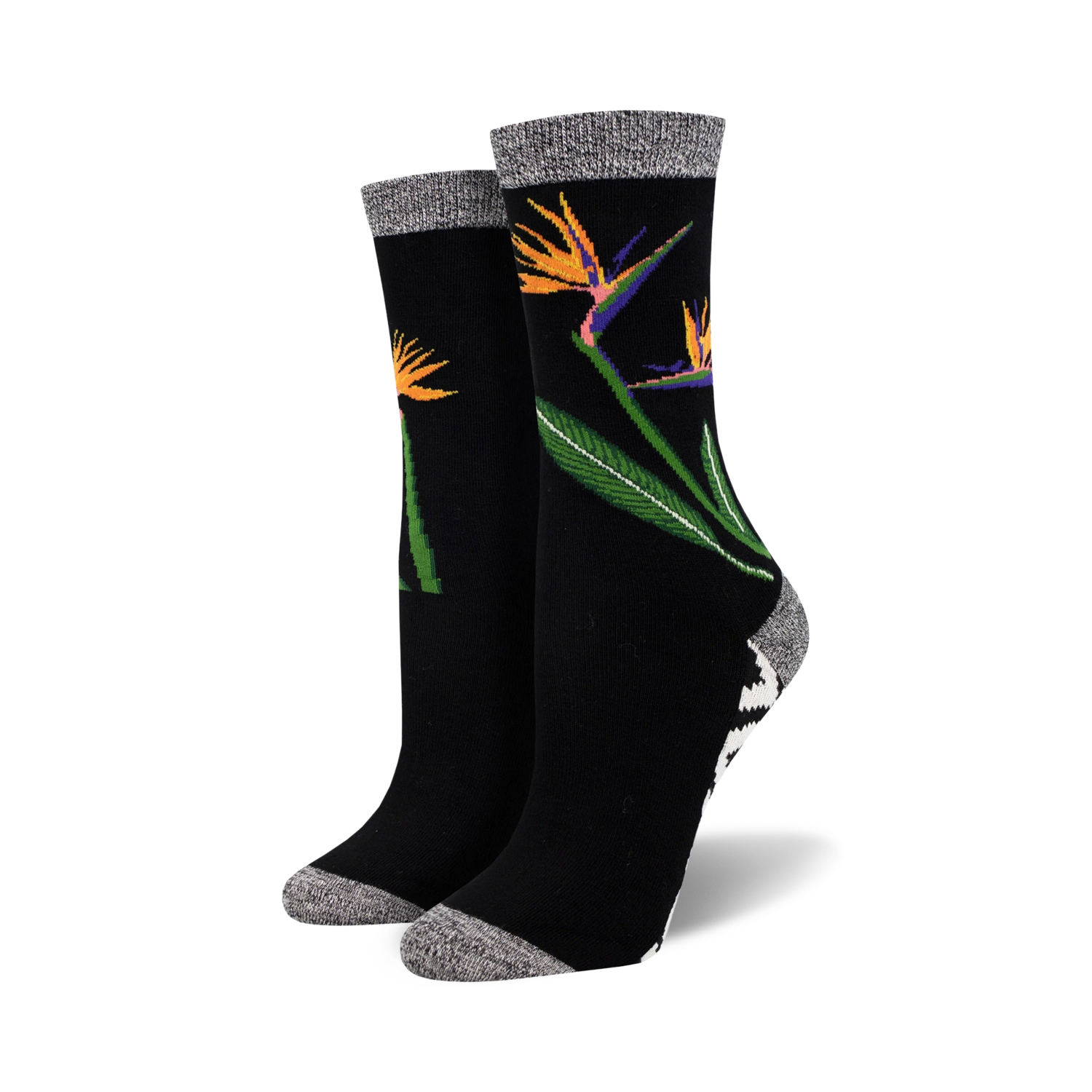 Close-up of a pair of black Birds of Paradise bamboo socks.  The socks feature a grey marl cuff and a black and white geometric pattern at the ankle.