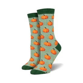 light sage green crew socks with cartoon pumpkin pattern, perfect for halloween.   
