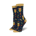 Pair of women's crew socks. Dark blue background with repeating pattern of owls, leaves, and berries. Gold top trim.