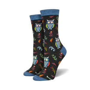 black crew socks with colorful owls, leaves, and flowers pattern. womens owl socks.   