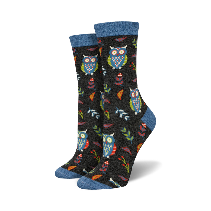 black crew socks with colorful owls, leaves, and flowers pattern. womens owl socks.   