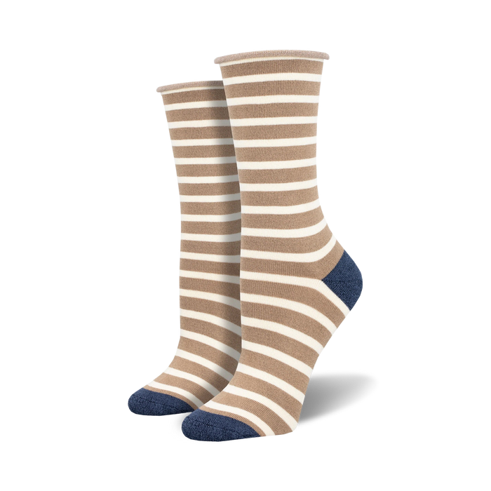 Pair of beige and white horizontally striped crew socks with navy blue heels and toes, beige cuffs.
