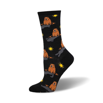 Black crew socks with a repeating pattern of orange groundhogs and yellow suns.