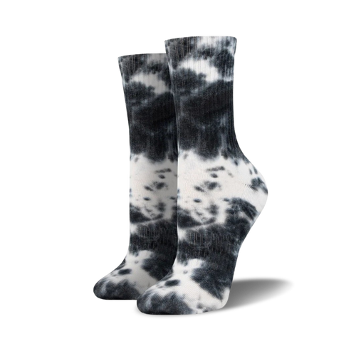 Pair of black and white tie-dye athletic crew socks shown on a white background.