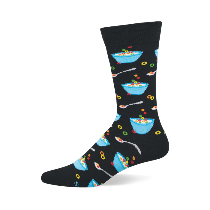 A black crew sock with a repeating pattern of light blue bowls filled with colorful fruity cereal, milk, and silver spoons. }}