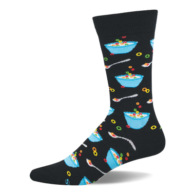 A black crew sock with a repeating pattern of light blue bowls filled with colorful fruity cereal, milk, and silver spoons.