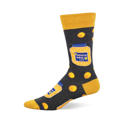 One crew sock, dark grey with yellow cuff, heel, toe. Features jars of 'CHEESE BALLS YUM' and round yellow cheese puffs.
