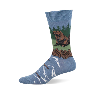 Light blue crew sock with a brown beaver sitting on green land, a brown log dam, green pine trees, and blue water with floating logs.