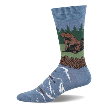 Light blue crew sock with a brown beaver sitting on green land, a brown log dam, green pine trees, and blue water with floating logs.