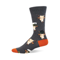 Grey crew socks with repeating pattern of light brown cow faces in sailor hats, fedoras, and flower crowns. Orange heel and toe.
