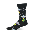 Black crew socks with a repeating pattern of grey UFOs abducting green aliens, with cow heads visible inside the saucers.