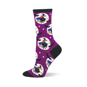 Purple crew sock with black cuff, heel, toe. Features flying witches on brooms in white moons, black bats, and white stars.