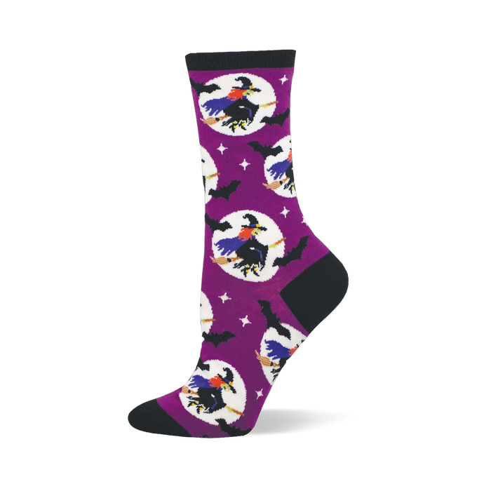 Purple crew sock with black cuff, heel, toe. Features flying witches on brooms in white moons, black bats, and white stars. }}