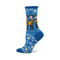 Bright blue crew socks with a pattern of skeleton mariachi musicians, guitars, white flowers, paisley, and music notes.