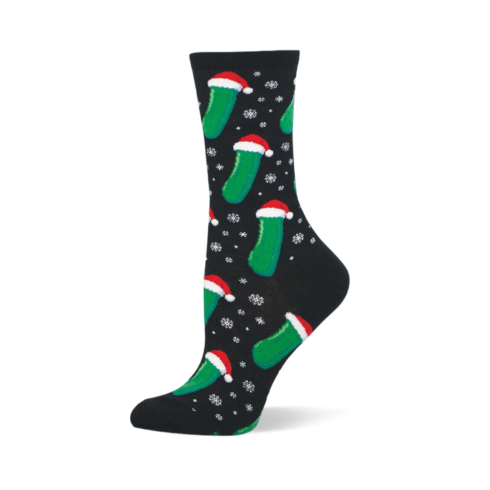 Christmas Pickle socks: Black crew socks with green pickles wearing Santa hats and white snowflakes.