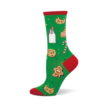 Green crew sock with red toe, heel, and cuff, featuring a pattern of milk, chocolate chip cookies, gingerbread man and house, and candy canes.