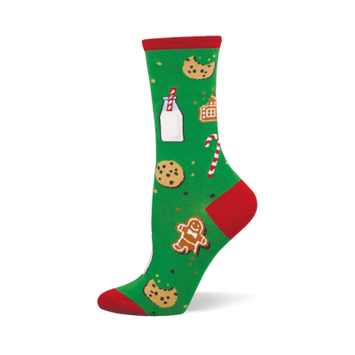 Green crew sock with red toe, heel, and cuff, featuring a pattern of milk, chocolate chip cookies, gingerbread man and house, and candy canes.