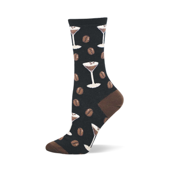 Black crew socks with a repeating pattern of white espresso martini glasses and brown coffee beans. Brown heel and toe.