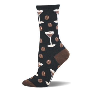 Black crew socks with a repeating pattern of white espresso martini glasses and brown coffee beans. Brown heel and toe.