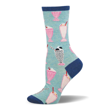 Crew sock with a light blue background, covered in pink and speckled grey milkshakes. Dark blue cuff, heel, and toe.