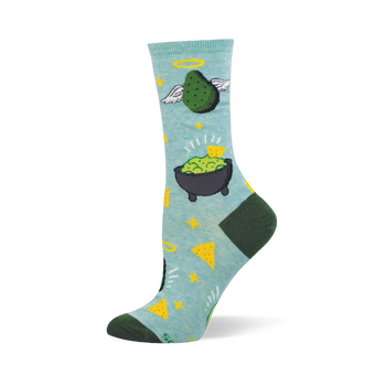 Light blue crew sock with an angelic green avocado, guacamole in a molcajete, yellow stars, and tortilla chips. Dark green heel and toe.