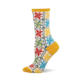 Single crew sock with colorful quilt pattern: red, green, blue, yellow star blocks on cream, with mustard heel, toe, cuff.