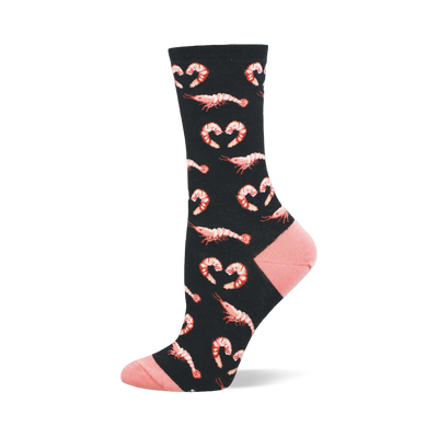 Black crew sock with repeating pattern of reddish-pink shrimp and shrimp-formed heart shapes. Features soft pink toe and heel.