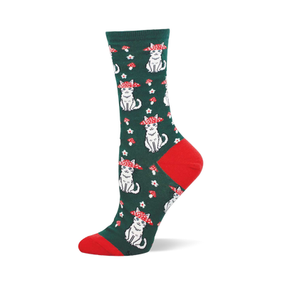 Green crew sock with red heel and toe. The pattern shows white sitting cats wearing red and white mushroom caps as hats.
