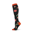 A knee-high black sock with a pattern of red flowers, light green centers, and dark green leaves. Features orange cuff, heel, and toe.