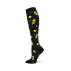 Black knee-high sock with a repeating pattern of green cocktail olives with red pimentos on skewers and white starbursts.