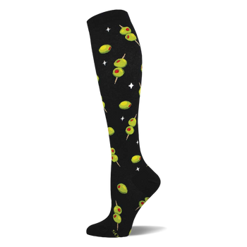 Black knee-high sock with a repeating pattern of green cocktail olives with red pimentos on skewers and white starbursts.