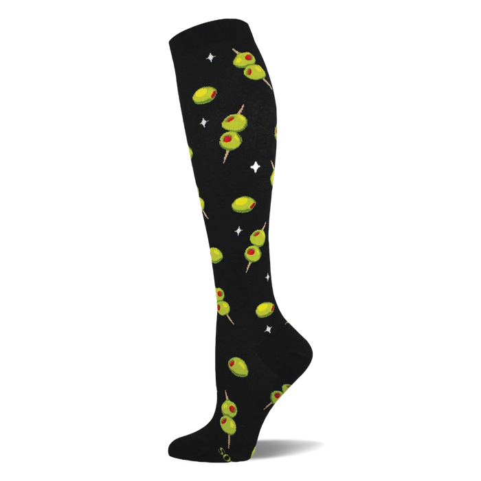 Black knee-high sock with a repeating pattern of green cocktail olives with red pimentos on skewers and white starbursts. }}