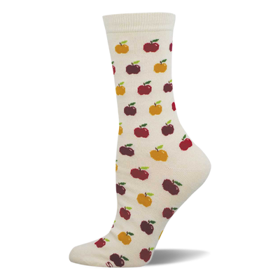 Cream crew socks with a repeating pattern of red, dark red, and yellow pixelated apples, each with a green stem.