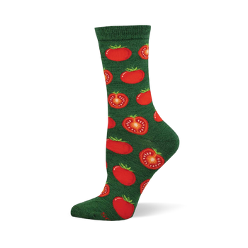 Single dark green crew sock with a repeating pattern of whole and sliced red tomatoes. Whole tomatoes have green stems; sliced show seeds.