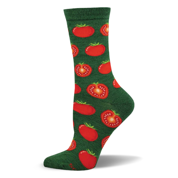 Single dark green crew sock with a repeating pattern of whole and sliced red tomatoes. Whole tomatoes have green stems; sliced show seeds. }}