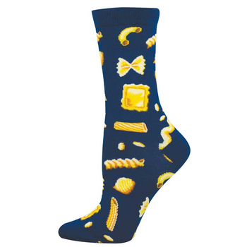 Single crew sock on a foot. Dark blue sock with a pattern of various golden yellow pasta shapes like farfalle, ravioli, and fusilli.