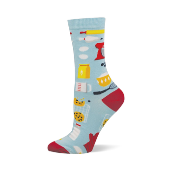 Light blue bamboo crew sock with baking pattern: red stand mixer, flour, cookies, milk, rolling pin, whisk. Red heel & toe.