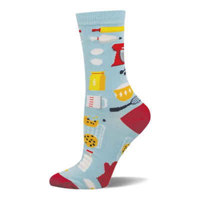 Light blue bamboo crew sock with baking pattern: red stand mixer, flour, cookies, milk, rolling pin, whisk. Red heel & toe.