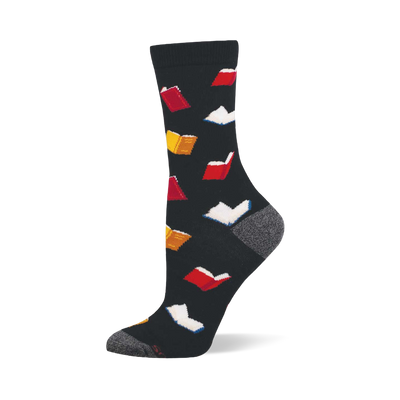 Dark grey bamboo crew sock with a scattered pattern of open books in red, yellow-orange, and white with blue edges. Grey heel and toe.
