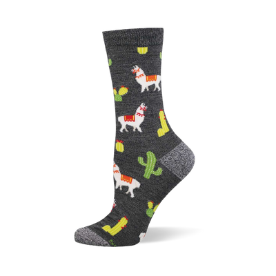 One heather grey crew sock with a repeating pattern of white llamas with red and yellow saddles, green cacti, yellow elongated shapes, and red chili peppers.