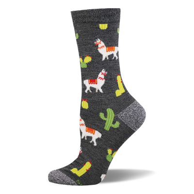 One heather grey crew sock with a repeating pattern of white llamas with red and yellow saddles, green cacti, yellow elongated shapes, and red chili peppers.