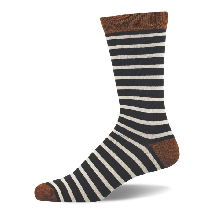 A pair of black crew socks with light grey horizontal stripes, dark green cuffs, heels, and toes, neatly folded.