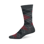 A single dark grey crew sock with a prominent argyle pattern of black, dark red, and grey diamonds.