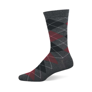 A single dark grey crew sock with a prominent argyle pattern of black, dark red, and grey diamonds.