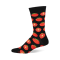 Black crew sock with a repeating pattern of red whole and half-sliced tomatoes showing green stems and yellow seeds.