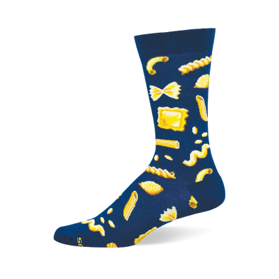 A single dark blue crew sock with a repeating pattern of yellow pasta shapes, including macaroni, bow-ties, penne, and ravioli.