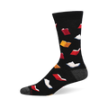 A black crew sock with a scattered pattern of small open books in red, white, and yellow. Grey heel and toe details.